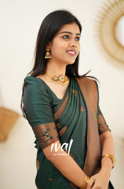 Dark Green Pure Soft Silk Saree With Confounding Blouse Piece