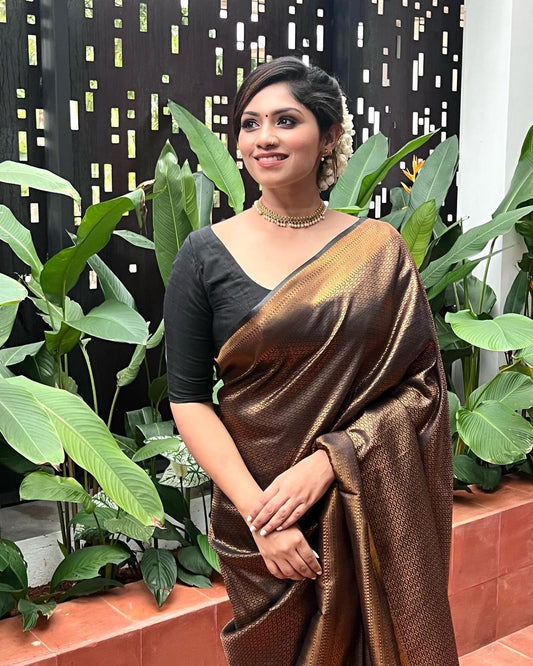 Black Pure Soft Silk Saree Weaved With Copper Zari Comes With Tempting Heavy Brocade Blouse Piece