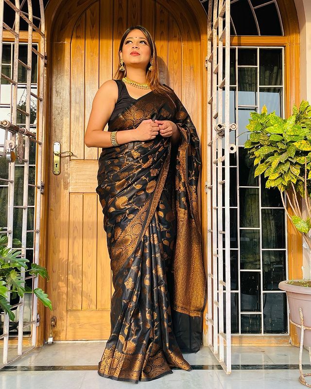 Symmetrical Black Pure Soft Silk Saree With Engrossing Heavy Brocade Blouse Piece