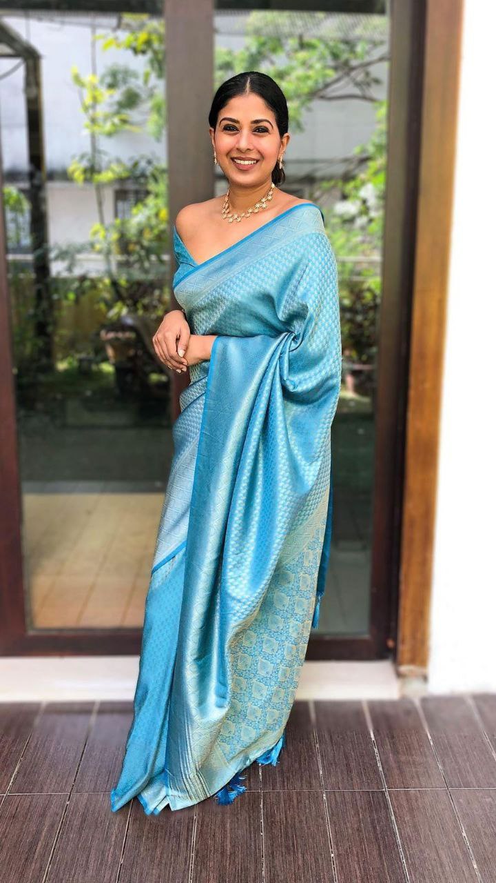 Sky Blue Semi Silk Saree Weaved With Copper Zari With Attached Heavy Brocade Blouse